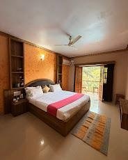 Hotel Ashvem Beach Inn - Deluxe AC Cottage Bedroom with Balcony